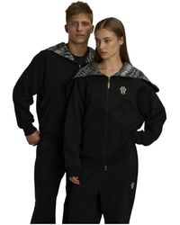 Anta - Zip-Throughs - Lyst