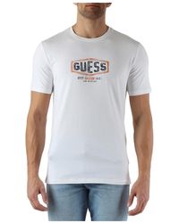 Guess - T-shirt slim fit cotone stretch logo - Lyst