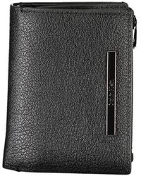 Calvin Klein - Portafoglio elegante in pelle nera con tasca per monete - Lyst
