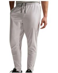Nike - Unlimited Dri-Fit Zip Cuff Versatile Broeken With Tapered Design - Lyst