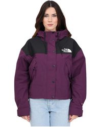 The North Face - Giacca a vento nero viola reign on - Lyst