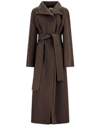 KHAITE - Belted Coats - Lyst