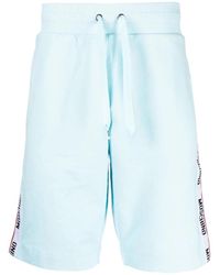 Moschino - Korte Broeken ,Blauw ,Katoen Casual Blauwe Katoen Elastaan Shorts - Lyst
