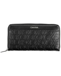 Calvin Klein - Geldbörse schwarz rfid reißverschluss - Lyst