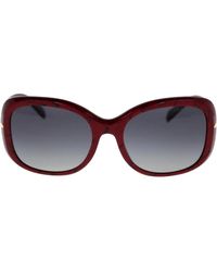 Prada - Ikonoische sonnenbrille für frauen mit polarisierten gläsern - Lyst