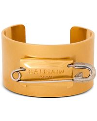 Balmain - Bracciale motivo pilla da balia in ottone - Lyst