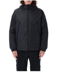 Snow Peak - Giacca piumino nera collo alto - Lyst