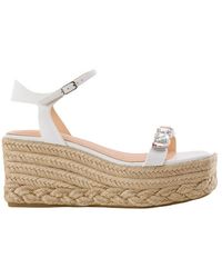 Sandali con plateau Guess da donna - Fino al 48% di sconto | Lyst