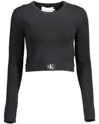 Calvin Klein - Maglione nero in elastan con logo - Lyst