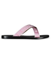 Givenchy - Sandalias planas de cuero - Lyst