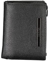 Calvin Klein - Portafoglio elegante in pelle nera con tasca per monete - Lyst