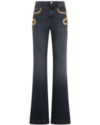 Roberto Cavalli - Flared Jeans Met Slangenborduursel - Lyst