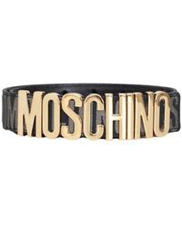 Moschino - Schwarzer gürtel mit goldenen buchstaben - Lyst