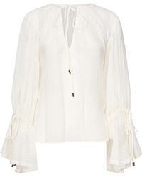 Guess - Witte Blouse Met Wijduitlopende Mouwen En V-Hals - Lyst