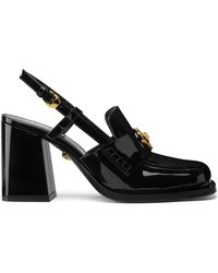 Versace - Schwarze sandalen mit absatz und kristallverzierungen - Lyst