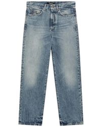 Versace - Studded Jeans - Lyst