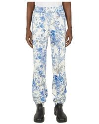(DI)VISION - Floral Print Track Pants - Lyst