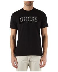 Guess - T-shirt slim fit in cotone con logo frontale - Lyst