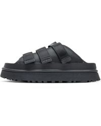 UGG - Goldenglow Slide Schwarze Sandalen - Lyst