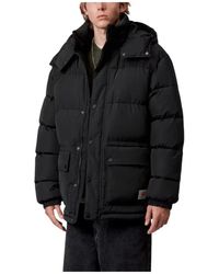 Carhartt - Winter Jackets - Lyst