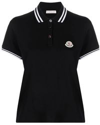 Moncler - Schwarzes gestreiftes polo shirt mit logo patch - Lyst