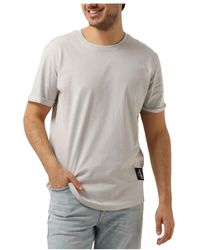 Calvin Klein - Polo t-shirt badge ärmel, polo t-shirt mit abzeichen, polo t-shirt mit badge und umgeschlagenen ärmeln - Lyst