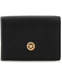 Versace - Accessoires ,Zwart ,Stijlvol Zwart Leren Portemonnee - Lyst