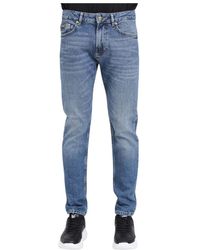 Versace - Indigo schmale dundee fit denim jeans - Lyst