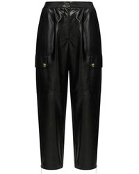 SIMONA CORSELLINI - Pantalón cargo negro con detalles de metal dorado - Lyst