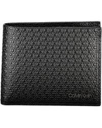 Calvin Klein - Portafoglio elegante in pelle con protezione rfid - Lyst