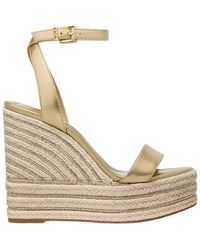 Michael Kors - Pale gold wedge sneakers leighton style - Lyst