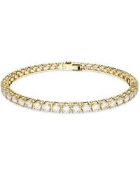 Swarovski - Pulsera tennis matrix, talla redonda, blanca, baño tono oro rosa - Lyst