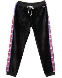 Champion - Schwarze Damen Hose Mit Rippenbündchen - Lyst