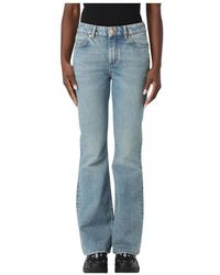 Balmain - Blaue Bootcut Jeans Für Frauen - Lyst