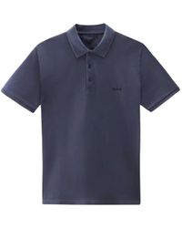 Woolrich - Blaues polo-shirt mit besticktem logo - Lyst
