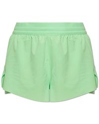 Nike - Fitness ,Groen ,Polyester Swift Dri-Fit 2-In-1 Hardloopshort Met Middelhoge Taille - Lyst