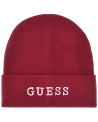 Guess - Accessoires ,Rood ,Polyester Geborduurde Logo Beanie - Lyst