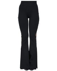 Versace Jeans Couture - Broeken ,Zwart ,Leer Zwarte Casual Broek Met Uitlopende Pijpen - Lyst