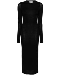 Saint Laurent - Vestido negro de punto con cuello alto - Lyst