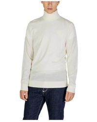 Calvin Klein - Woll Rollkragenpullover Klassische Passform - Lyst