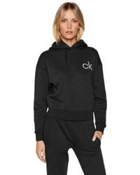 Ropa deportiva, de gimnasio y entrenamiento Calvin Klein de mujer: hasta el  49 % de descuento | Lyst