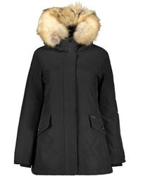Woolrich - Giacca nera con cappuccio e pelliccia removibile - Lyst