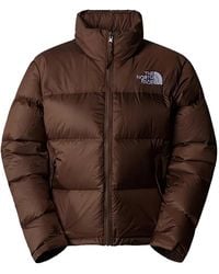 The North Face - Braune gesteppte jacke mit logo-print - Lyst