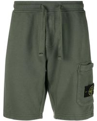 Stone Island - Grüne shorts mit taschen und elastischem bund - Lyst