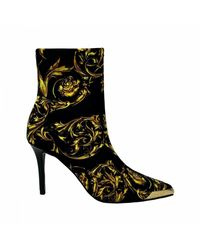 Stivali Versace Jeans Couture da donna - Fino al 70% di sconto | Lyst