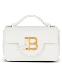Balmain - Mini-tasche b-buzz 17 aus genarbtem kalbsleder - Lyst