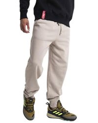Homme Vêtements Articles de sport et dentraînement Pantalons de survêtement Organics emb jogger 118365 629 pants Alpha Industries pour homme en coloris Vert 