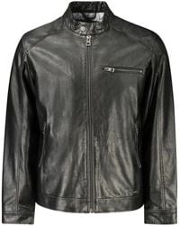 Guess - Schwarze Jacke Mit Langen Ärmeln Und Mehreren Taschen - Lyst