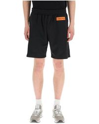 Homme Vêtements Shorts Shorts casual Short à patch logo Synthétique Heron Preston pour homme en coloris Noir 