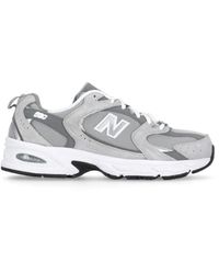 New Balance - Sneakers in pelle e tessuto grigio - Lyst